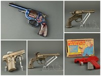 Group of toy pistols, including Red Ranger