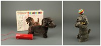 Group of 2 battery and wind-up motion dog toys