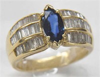 14K LADIES'  SAPPHIRE RING WITH BAGUETTE DIAMONDS.