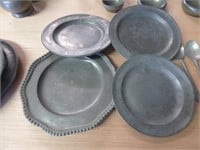 Group of 4 smaller pewter plates