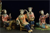 4 Chinese women sitting