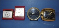 Three vintage travelling clocks