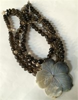 Three Strand Beaded Necklace With Shell Pendant
