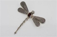 Articulated silver and garnet dragonfly pendant