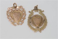 Two 9ct gold shield fobs