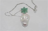 Baroque pearl and emerald pendant