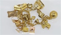 18ct yellow gold bracelet with world charms