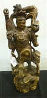 Chinese carved wood warrior figure with dragon