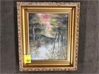 Small landscape painting with ornate gold frame