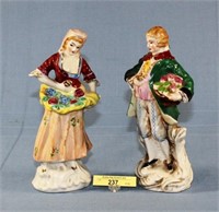 Pair Of Porcelain Colonial Figurines