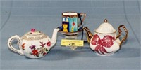 Two Miniature Tea Pots and Demi Cup And Saucer