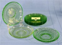 Six Depression Vaseline Glass Saucers