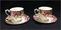 Pair Of Queen Anne Black Magic Cups And Saucers