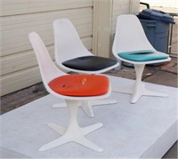 three outdoor kids chairs