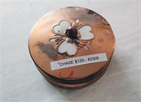 copper shell with glass dish inside
