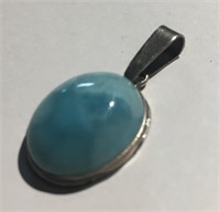 Sterling Silver And Blue Stone Pendant
