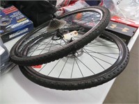 TWO BIKE TIRES ON RIMS