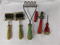 Wooden handled old kitchen utensils - can opener -