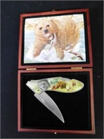 Switch blade pocket knife in box, Grizzly bear