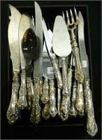 Assorted silver carving sets and serving pieces