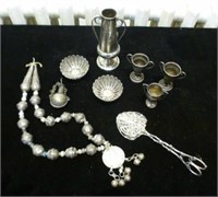 Basket of silver trophies and jewellery