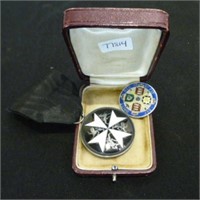 St. Johns Ambulance medal t/w another enamel coin