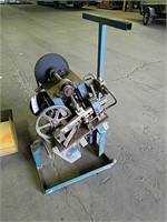 Wire crimping machine with cover.