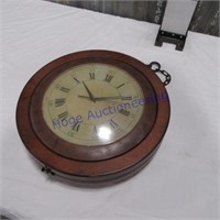 Double sided hanging clock