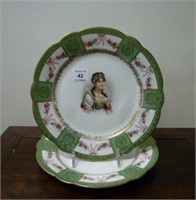 Pair of French porcelain portrait plates