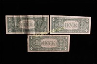 Three $1 Federal Reserve Notes