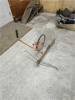 Crossbow And Measuring Wheel