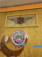 Farmall wall clock and Harley-Davidson sign