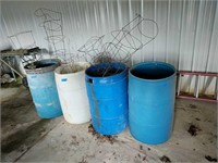 Plastic Barrels And Tomato Cages
