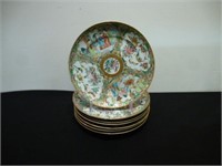 Seven Chinese Canton famille rose porcelain plates