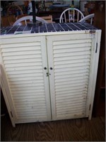 Shutter door cabinet with tile top