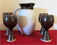 Pottery pitcher (9.5") and 4 goblets (6.5")