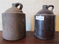 2 Stoneware whiskey jugs - 1 damaged