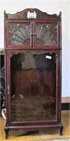Mahogany finish music cabinet with 2 doors over