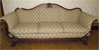 Depression era sofa with exposed mahogany