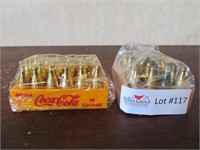 2 plastic Coca Cola trays in packaging