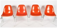 Four Orange Herman Miller DSS Stacking Chairs