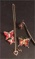 Incredible red and butterfly themed jewelry