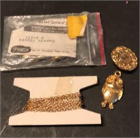 Various gold colored jewelry items