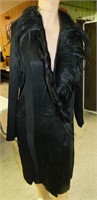 1920s Black coat trimmed in monkey fur