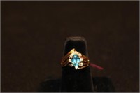 14kt yellow gold Ladies Blue Topaz & Diamond Ring