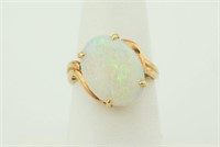14K Gold Ring with 3.75 Carat Opal. Size 8