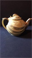 Vintage yellow and gold tea pot