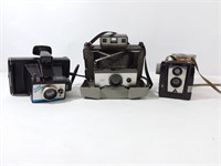 3 caméras: 2 Polaroid , une Tower