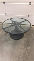 Glass top coffee table, 37 inches round