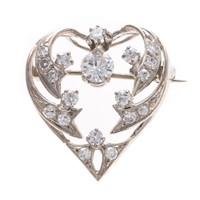 A Lady's Platinum Diamond Heart Pin/Pendant
